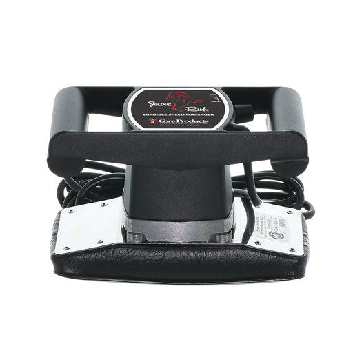 Jeanie Rub Massager and cord on white background. 
